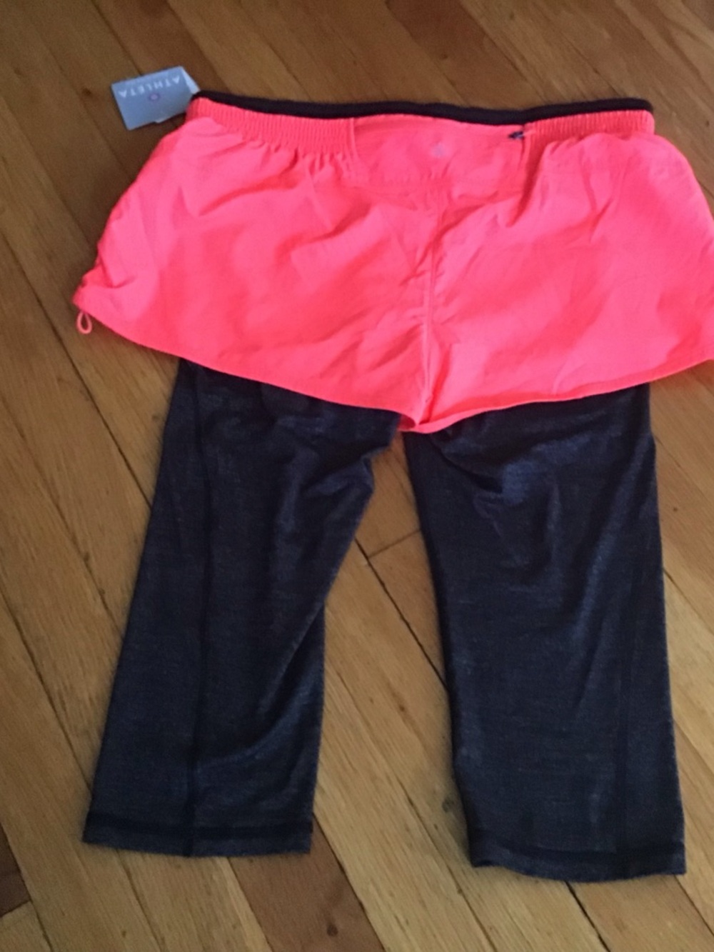 ATHLETA GO GETTER 2 Neon Coral Skort with Black Capri Leggings. Size Medium